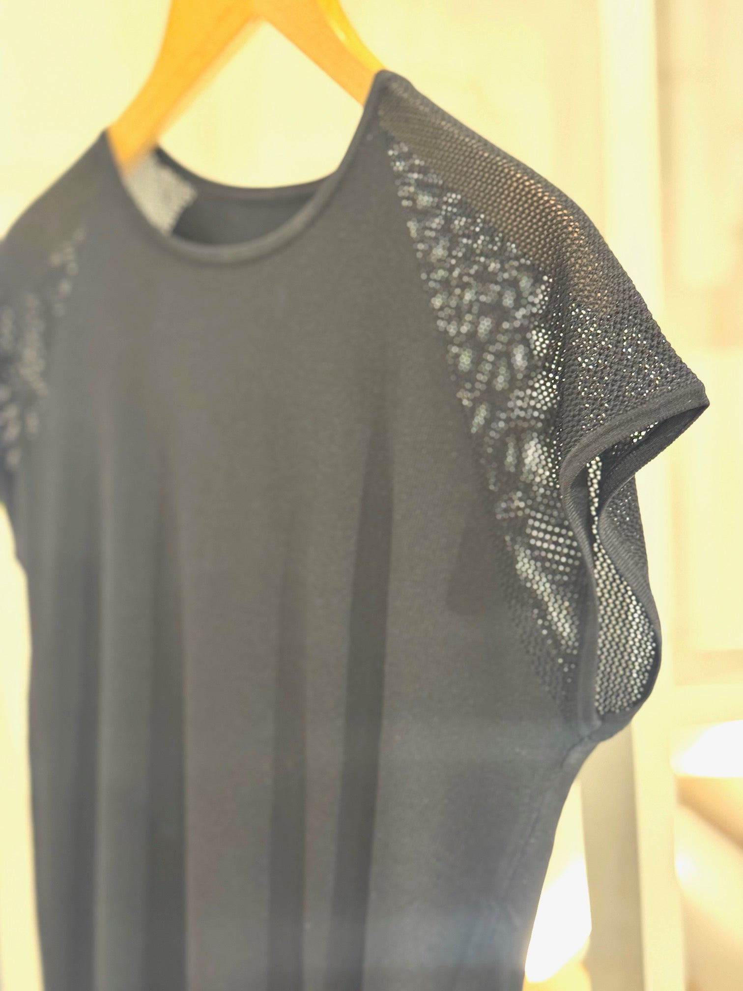 blouse with mesh on the shoulder