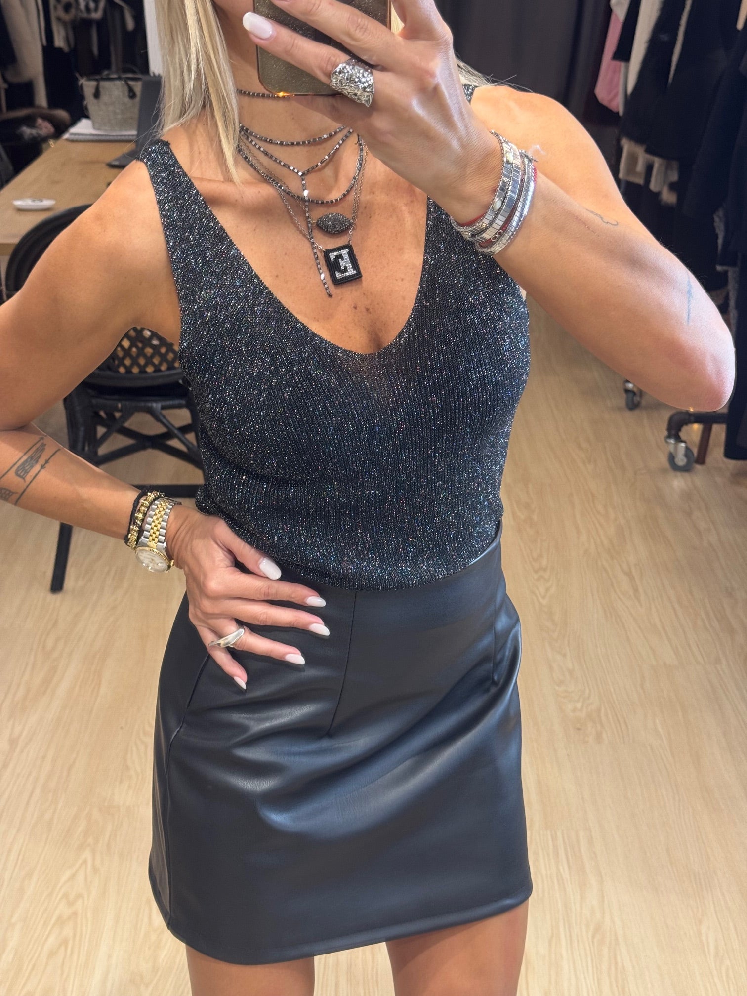 Leather mini skirt with pleats