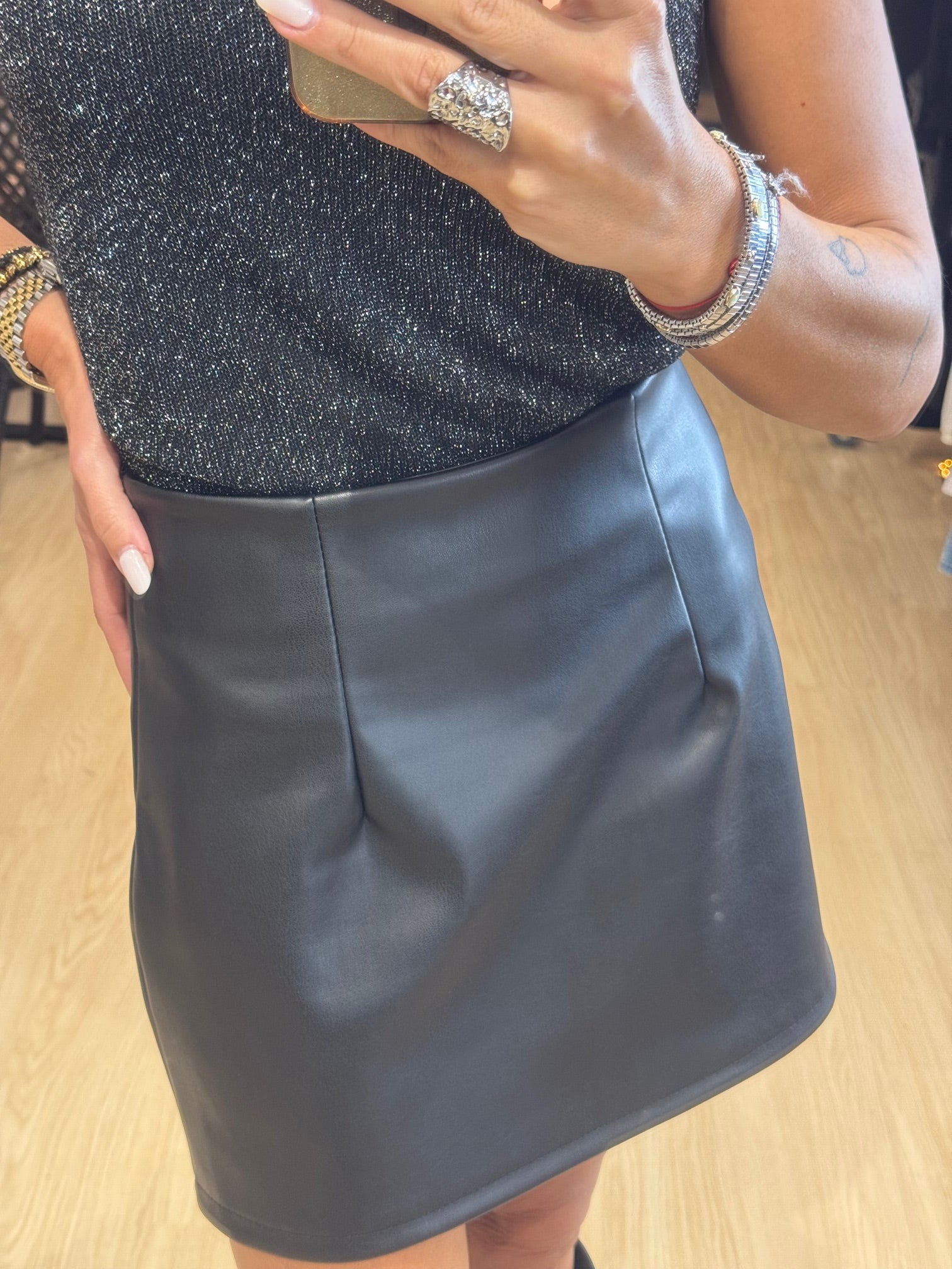 Leather mini skirt with pleats