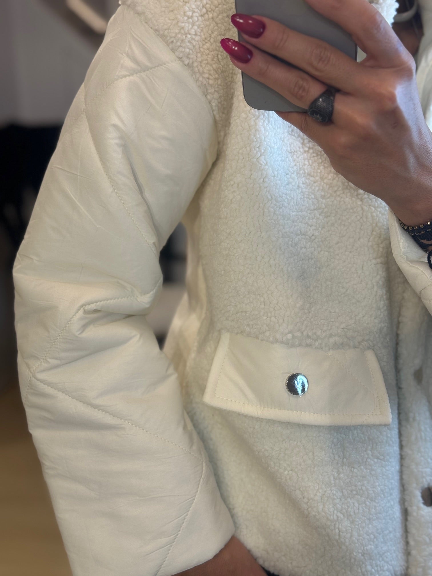 γούνινο σακάκι με τσέπες και πλεκτή πλάτη