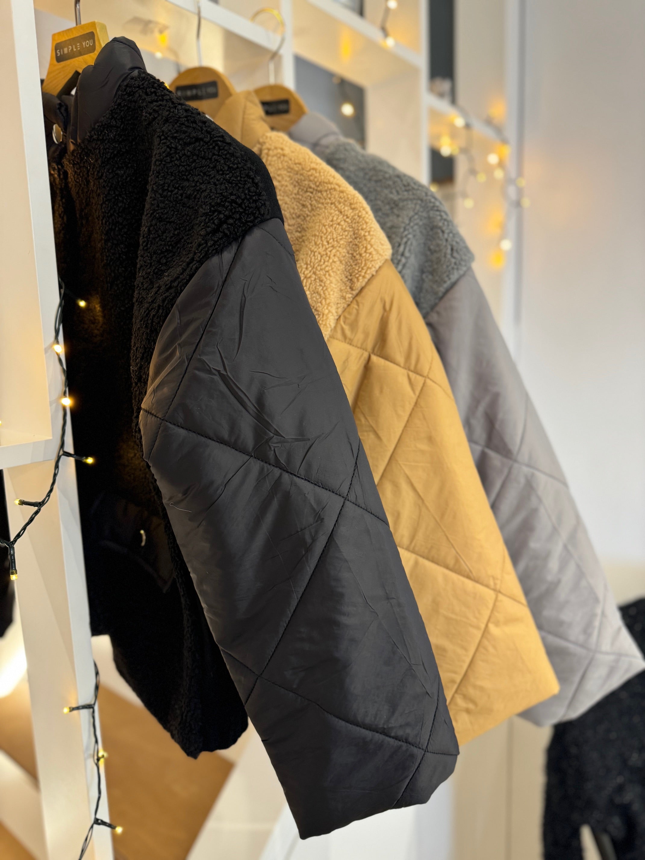 γούνινο σακάκι με τσέπες και πλεκτή πλάτη