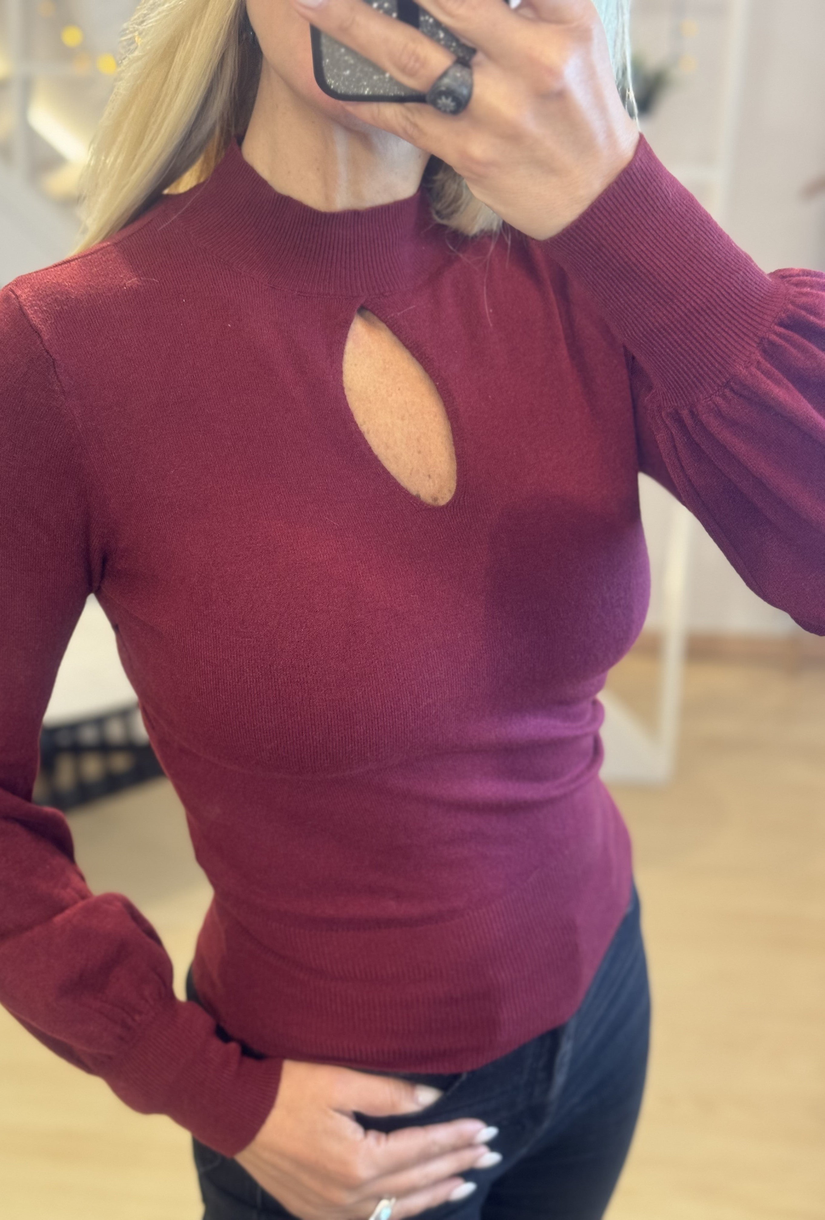 soft fine knit with a hole in the neck