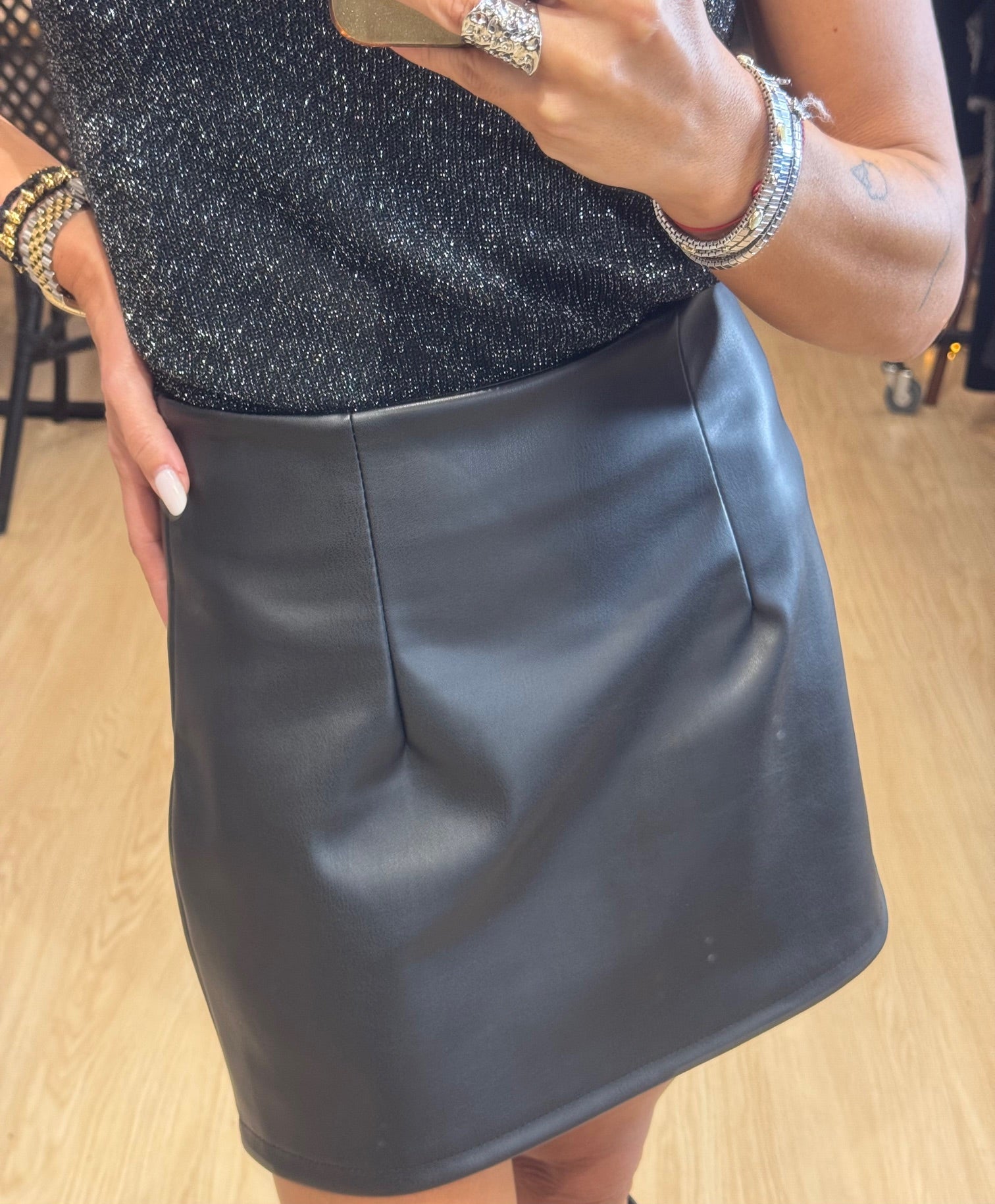 Leather mini skirt with pleats