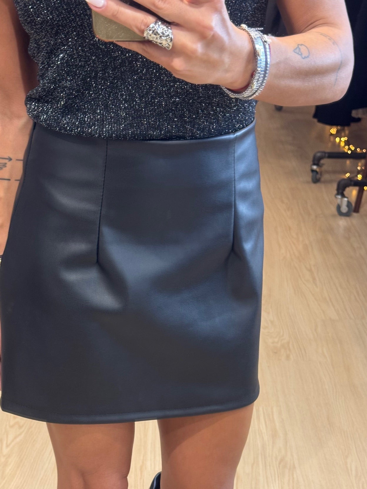 Leather mini skirt with pleats