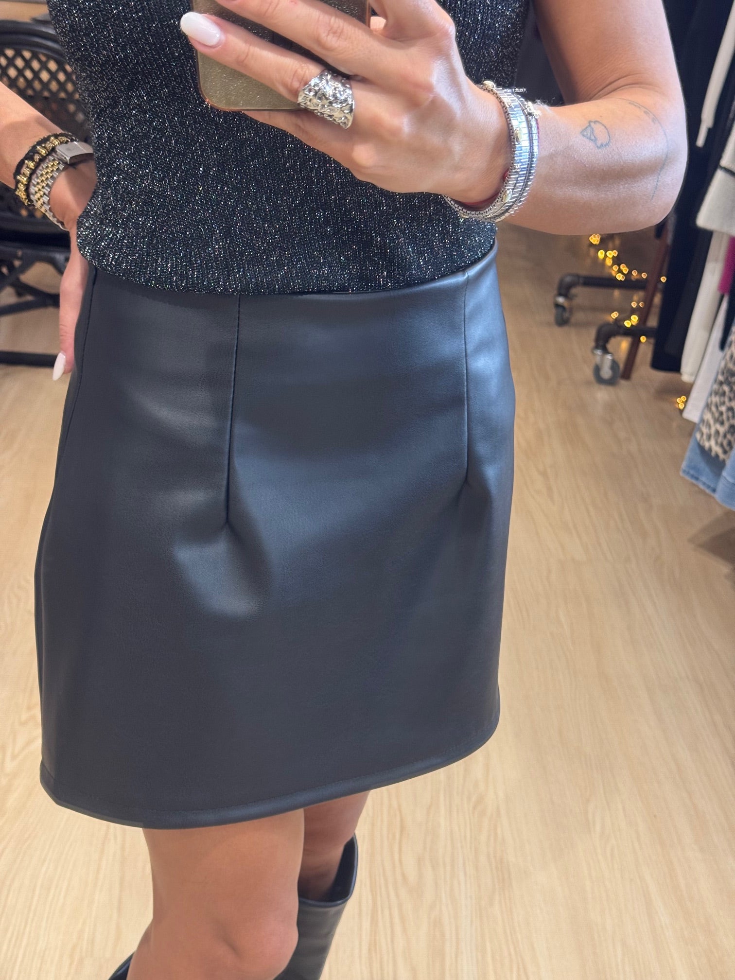 Leather mini skirt with pleats