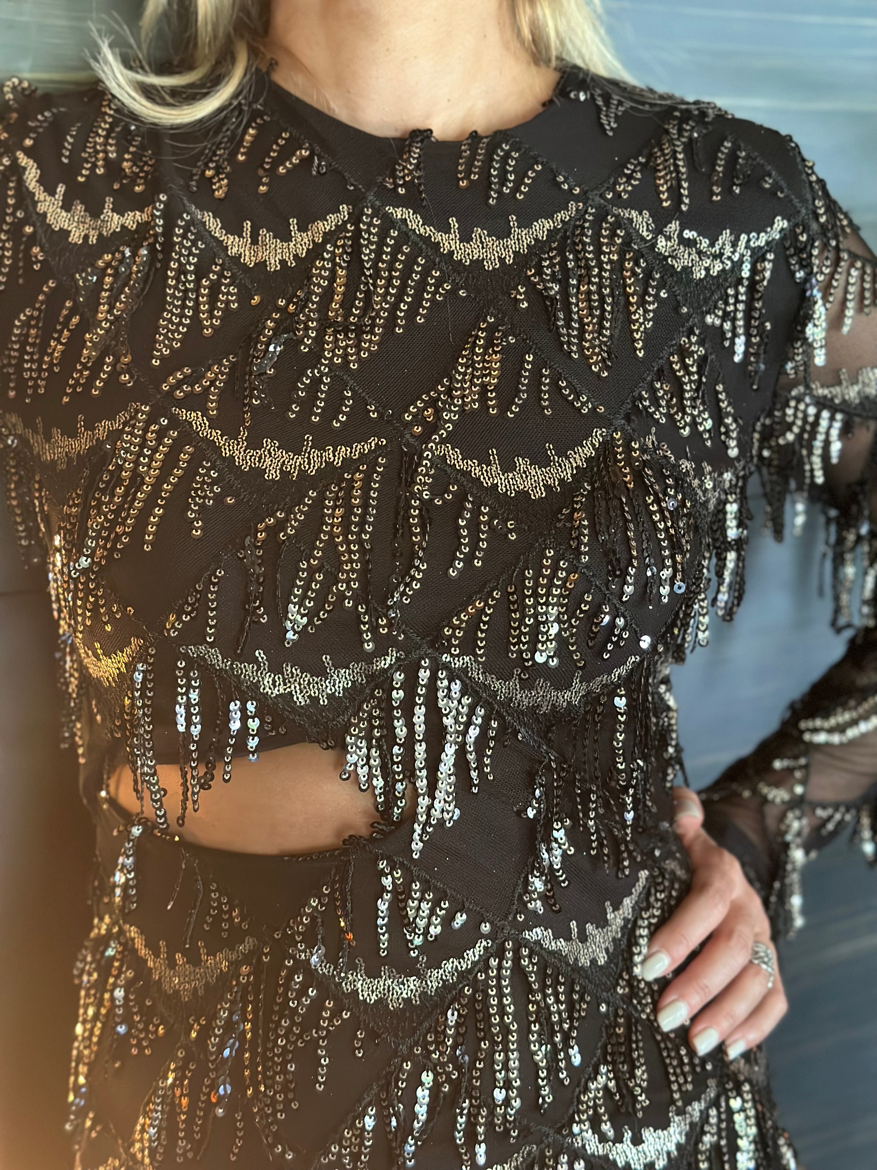 Dress with fringes and sequins